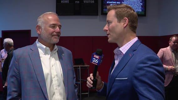 UH VP of Athletics celebrates Cougars' #1 seed