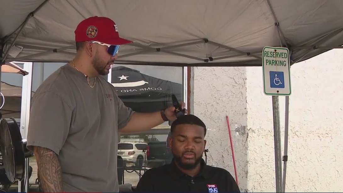 Houston barbershop buzzes through power outage