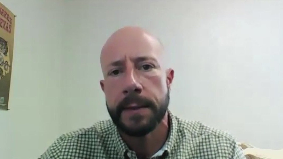 Houston woman found with alligator chewing on her