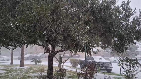 Snow falls in Pearland, Texas