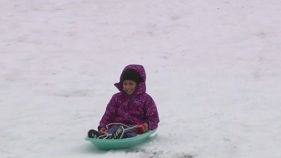 Houston families enjoy sledding at Hermann Park