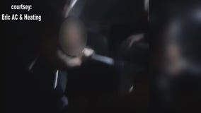 Flight passenger restrained by others after punching out window mid-flight