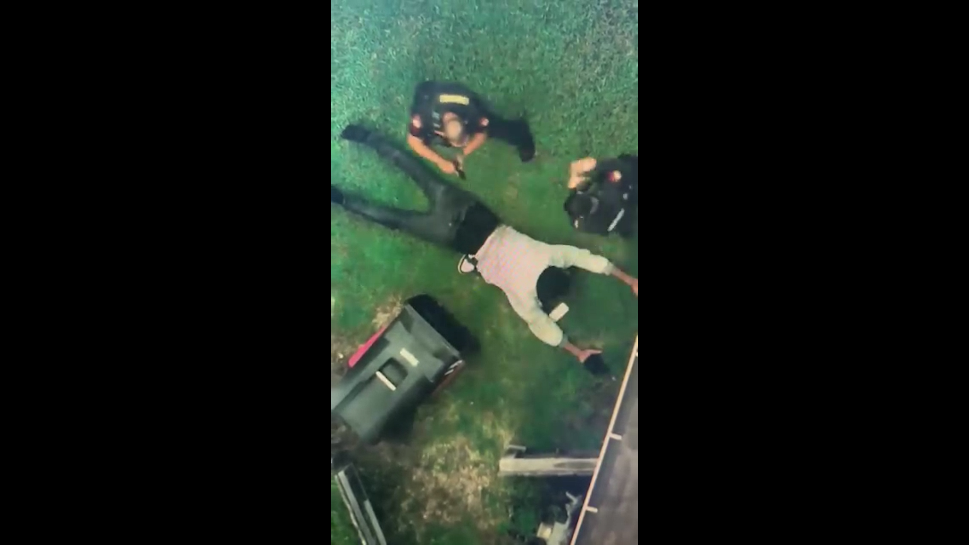 Suspect hiding in garbage can captured on drone video
