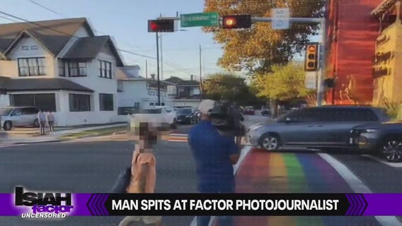 VIDEO: Man spits at Isiah Factor: Uncensored photojournalist