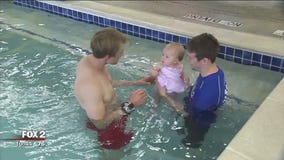 Out and About at swim class with Alan and his daughter