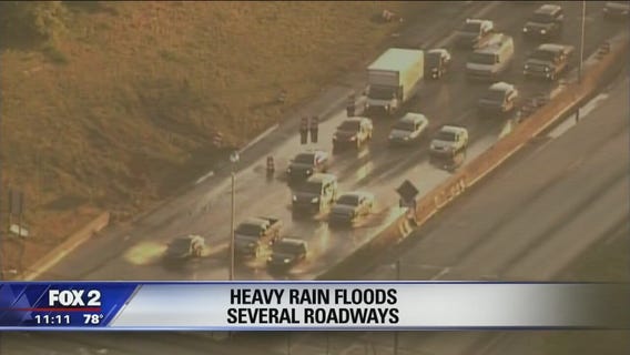 Heavy rains cause flooding on some Detroit-area freeways