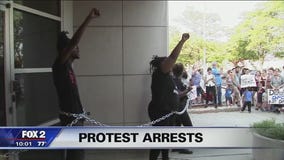 DPD arrests Black Lives Matter protesters for chaining selves to front door of 3rd Precinct