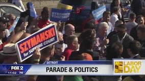 Bill Clinton joins union members for Labor Day parade in Detroit