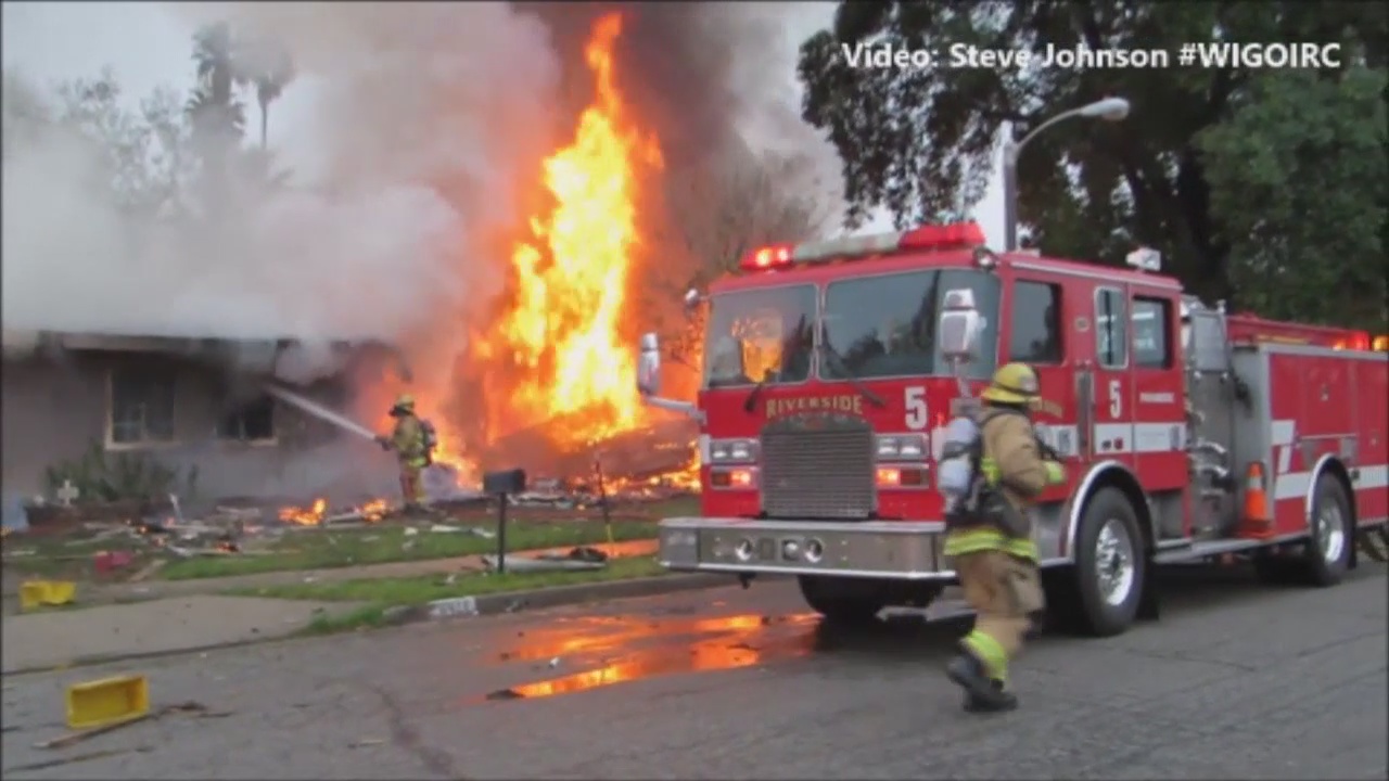 Small plane crashes into homes in Riverside neighborhood, killing 3 people