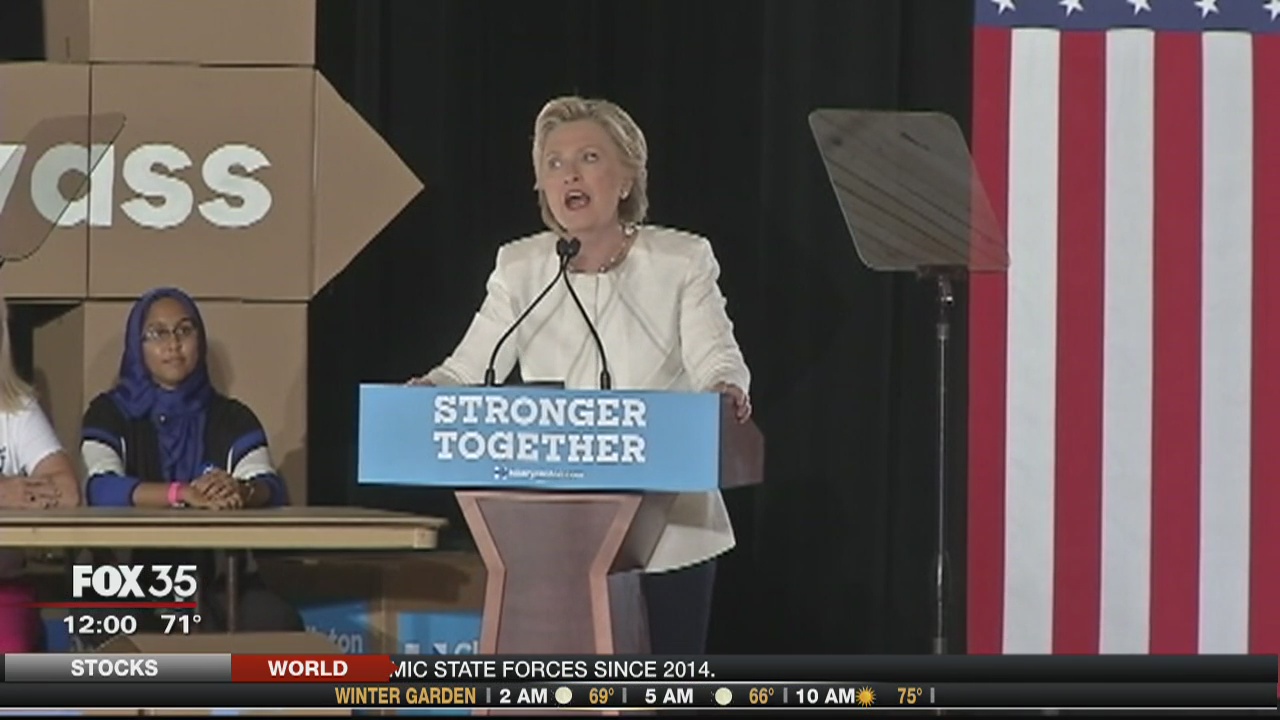 Clinton slams Trump on business record