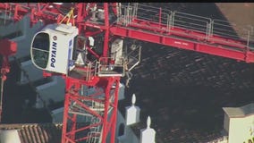 Woman climbs crane in Downtown LA