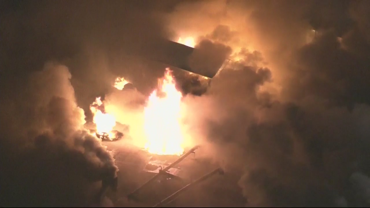 Crews battle large fire at South LA commercial building