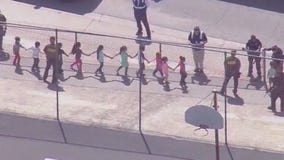 Mother of teacher's assistant recounts daughter's terror during North Park shooting