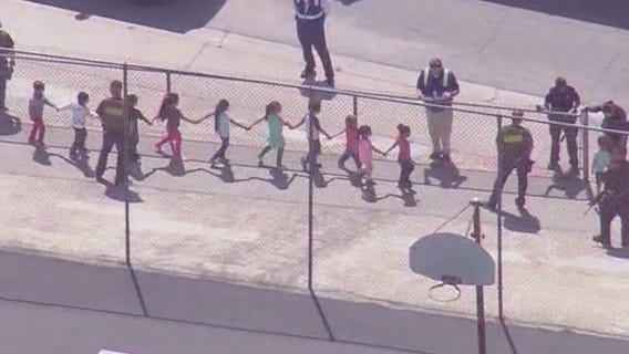 Mother of teacher's assistant recounts daughter's terror during North Park shooting