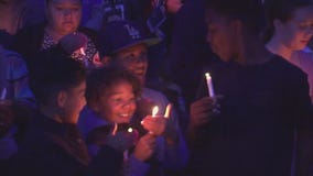 Community gathers for candlelight vigil in honor of North Park shooting victims