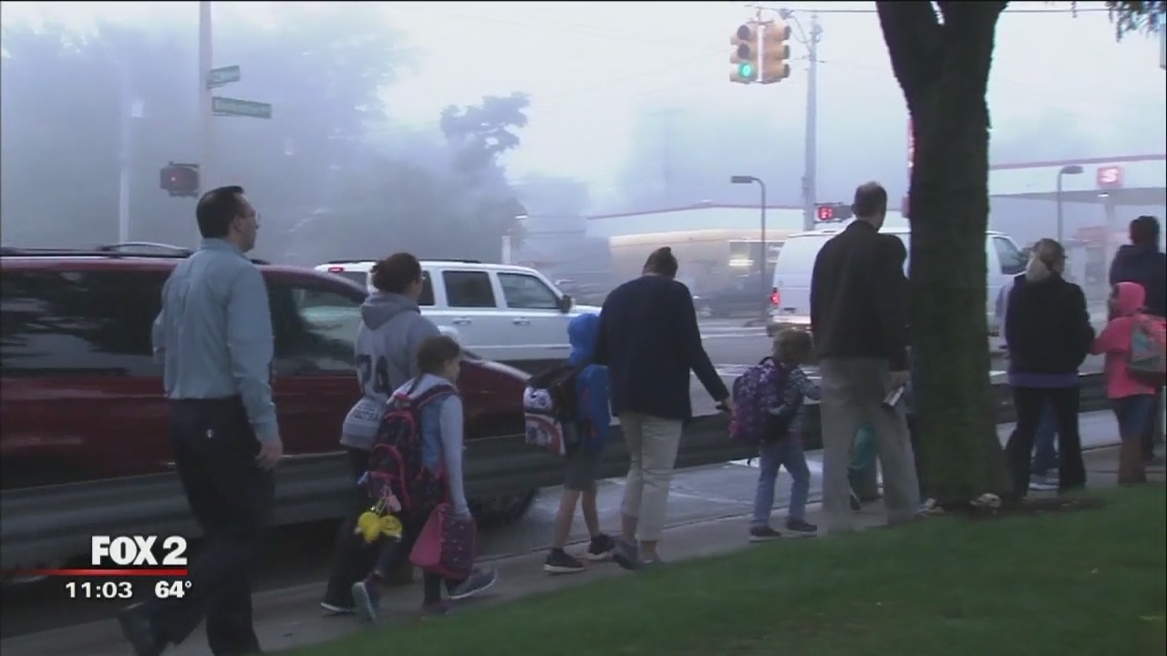 Firefighters walk students to school in Royal Oak