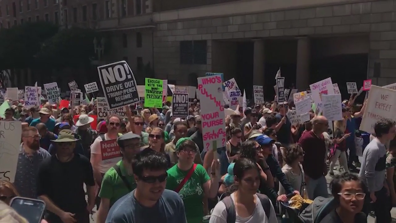 Thousands march in Downtown LA to pressure Trump to release tax returns