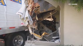 Multiple hurt after semi-truck crashes into Fullerton apartment building