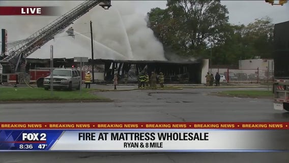 Huge fire burns at mattress store in Detroit