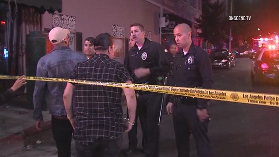 Police search for suspects in large Hollywood scuffle, stabbing