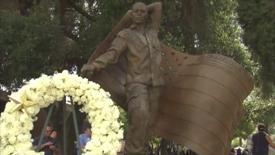 Sculpture, restored mural unveiled on Memorial Day