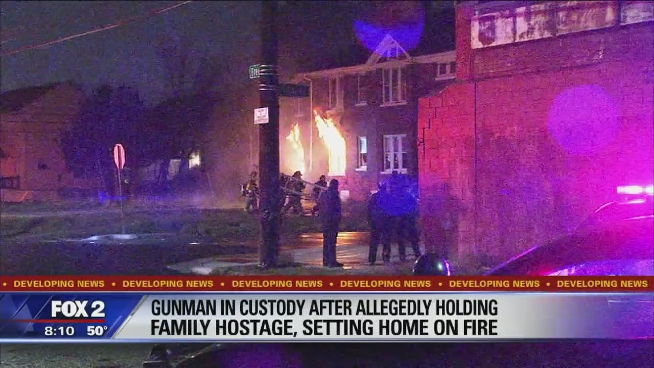 Police: Gunman barricaded himself, set fire to house with children inside