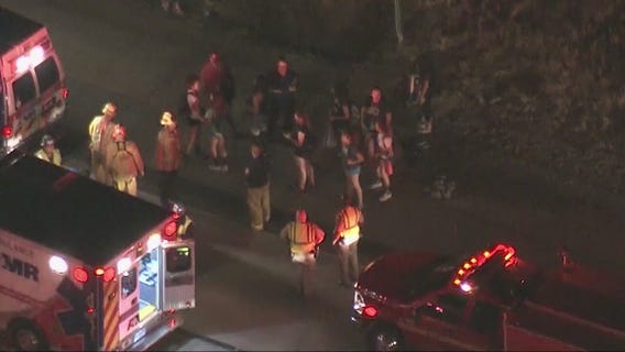 High school volleyball team escapes after school bus catches fire