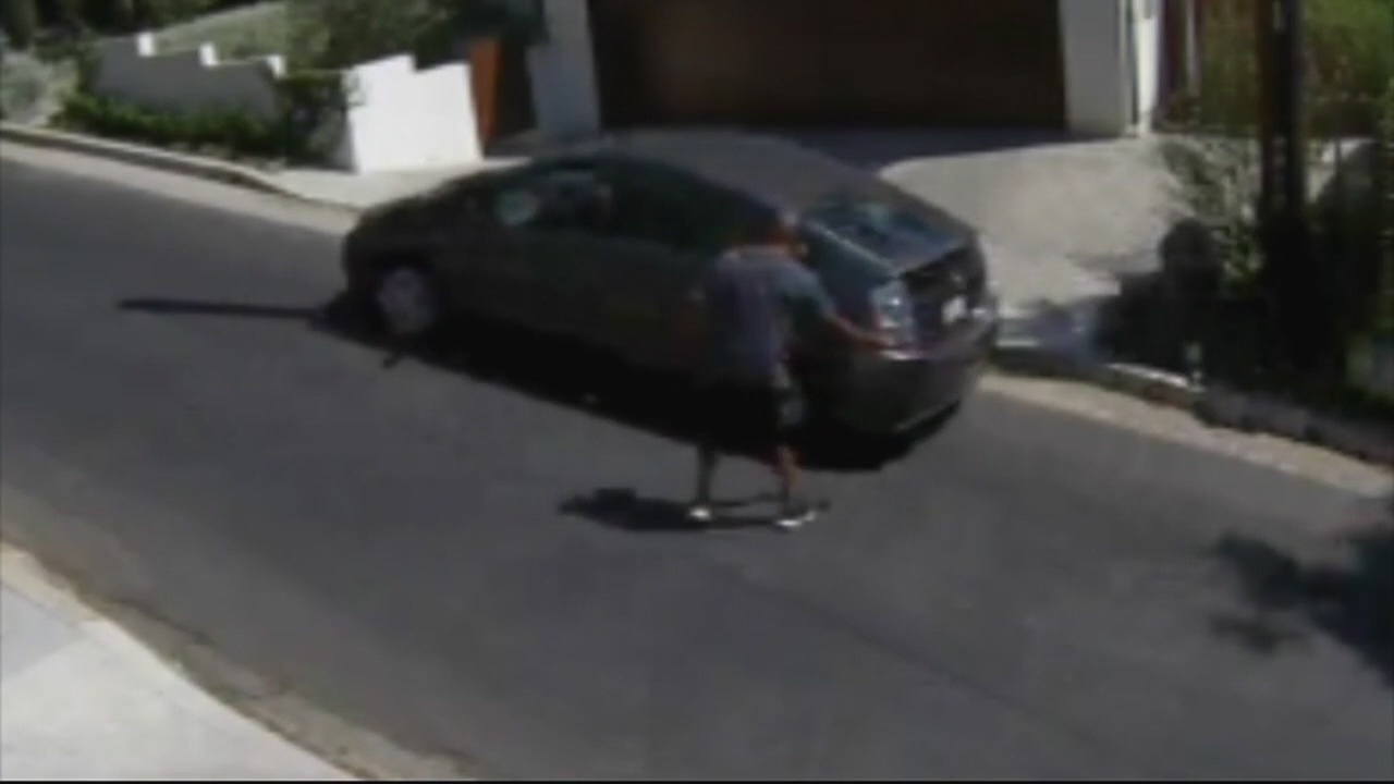 VIDEO: Man with hatchet attacks cars in Hollywood neighborhood