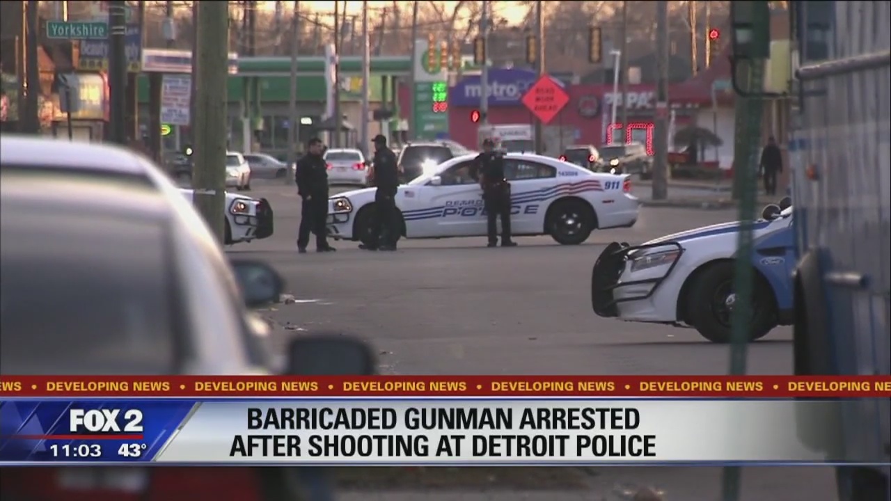 Barricaded gunman arrested after shooting at police