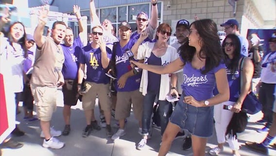 Dodgers fans look to Game 2 in third day of sweltering heat