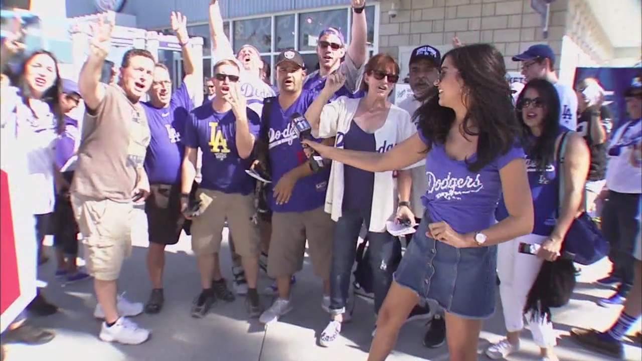 Dodgers fans look to Game 2 in third day of sweltering heat