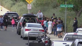 Riverside school evacuated after man barricaded in classroom with hostage