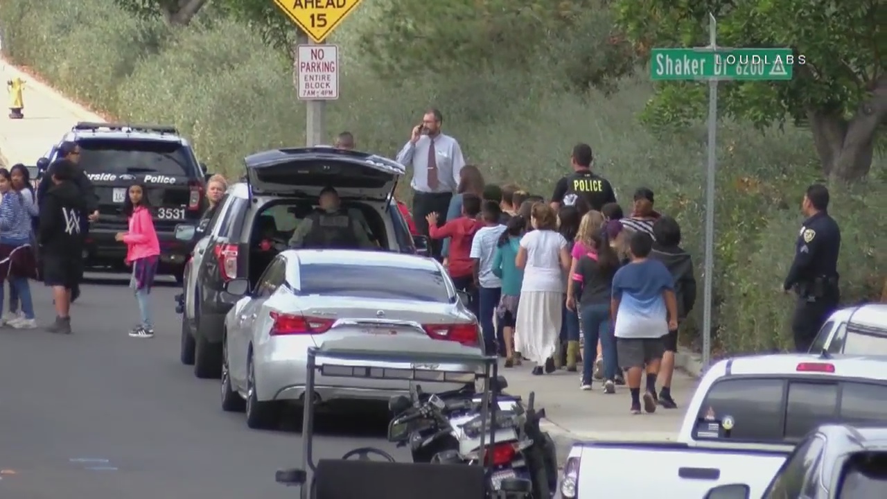 Riverside school evacuated after man barricaded in classroom with hostage