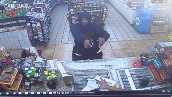 Armed robber chases clerk inside Santa Ana liquor store