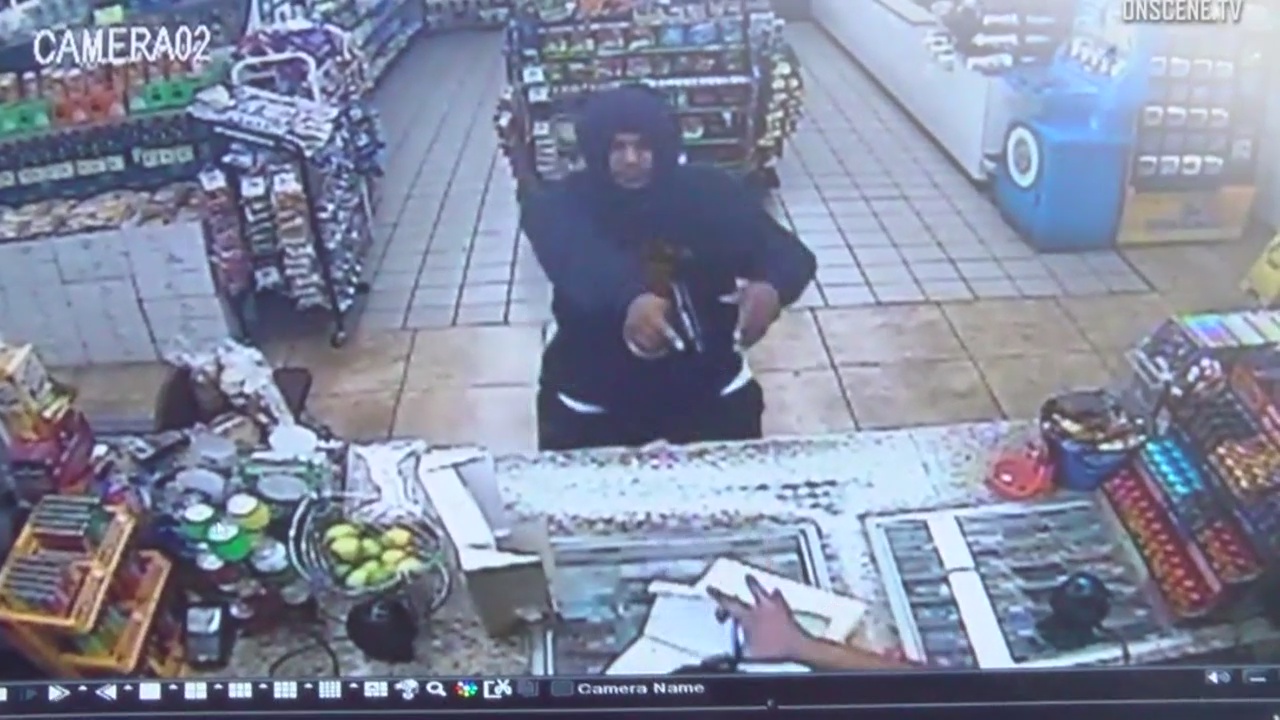 Armed robber chases clerk inside Santa Ana liquor store