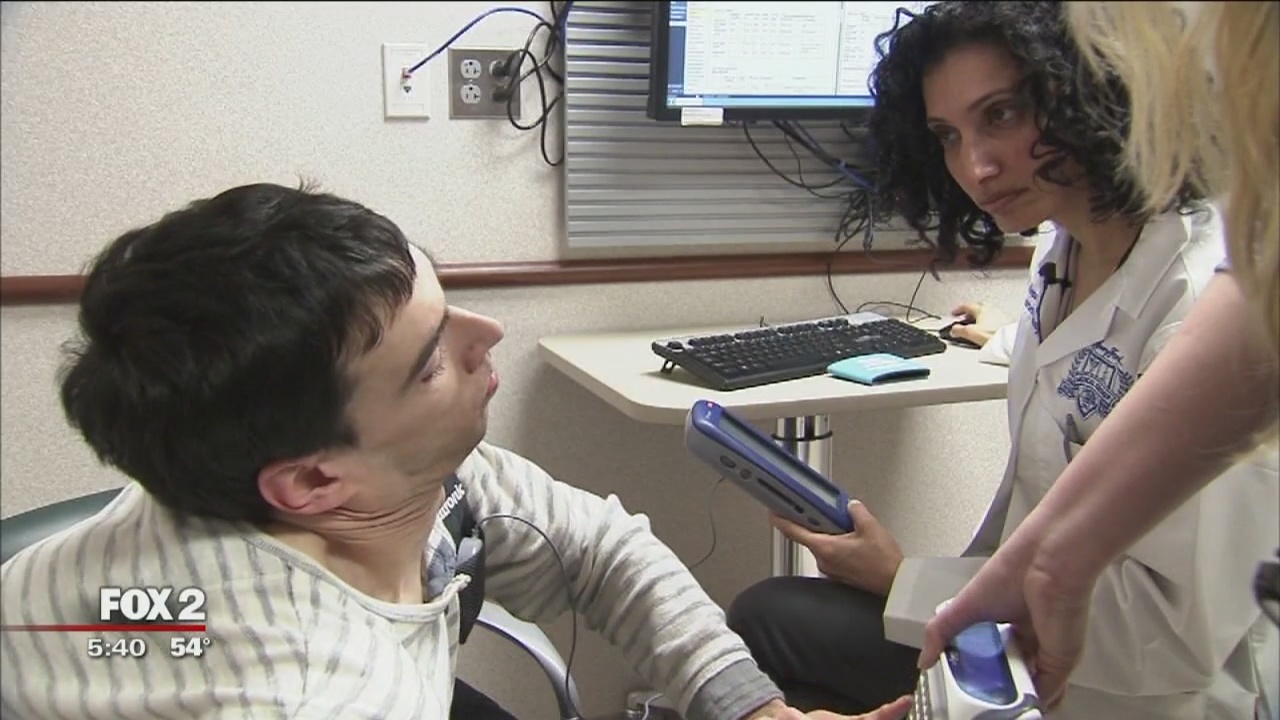 Electronic brain stimulation relieving Warren man's dystonia