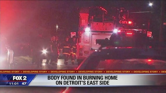 Body found bound and burned in Detroit driveway