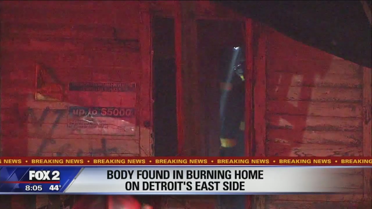 Woman's body found badly burned in Detroit driveway