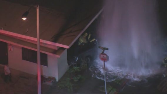 Truck slams into fire hydrant and apartment building in Bell