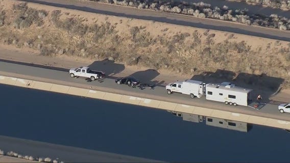 Man falls into CA aqueduct trying to save son