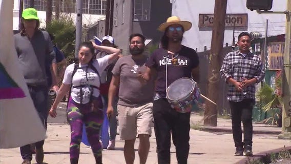 Locals walking to US-Mexico border