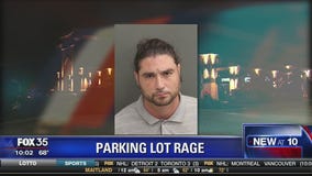 Man arrested in parking lot rage case