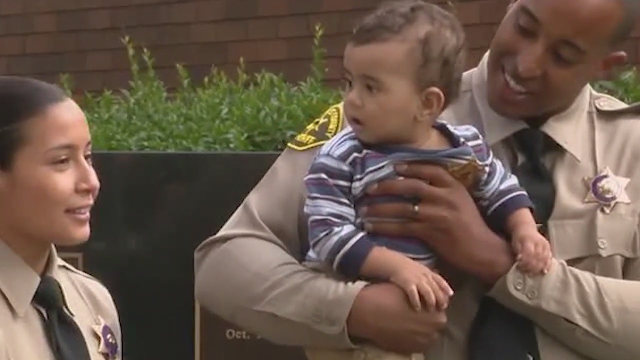 Deputies who helped save baby boy's life reunite with child and his parents