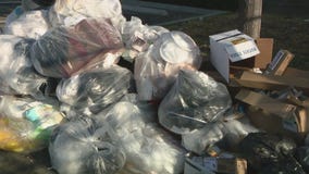 Garbage lining streets in Maywood after city changes trash companies