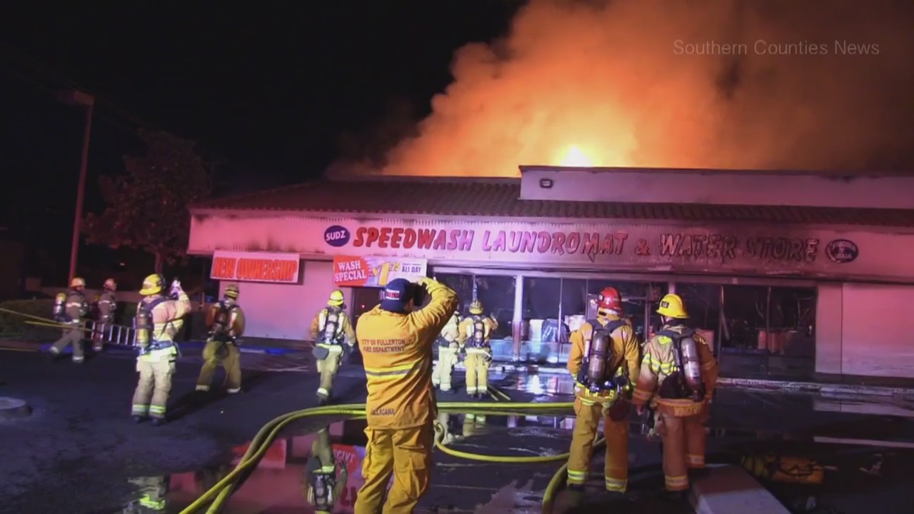 Fire destroys laundromat in Orange