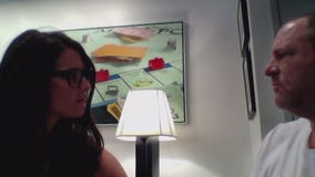 Video shows Weinstein caressing woman before alleged rape