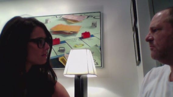 Video shows Weinstein caressing woman before alleged rape