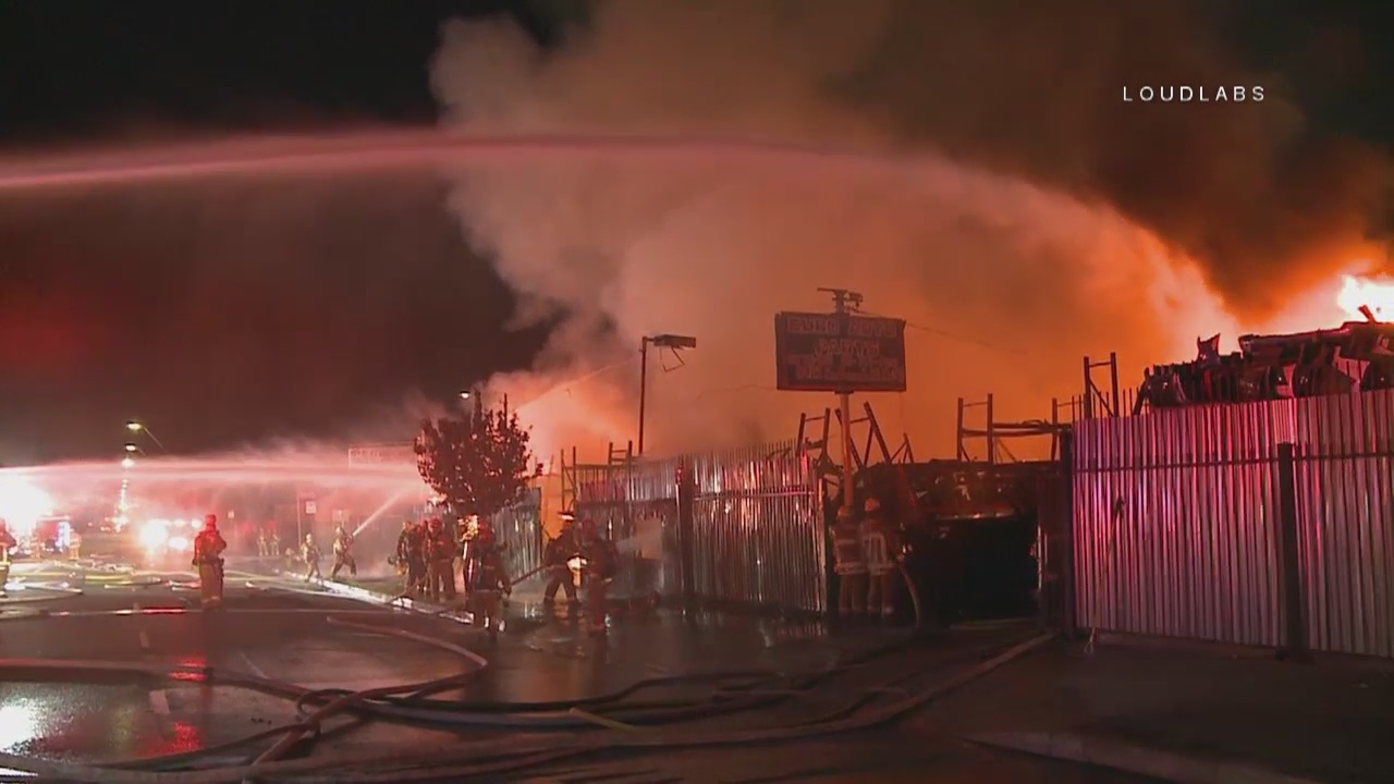 Flames burn through Sun Valley auto yard