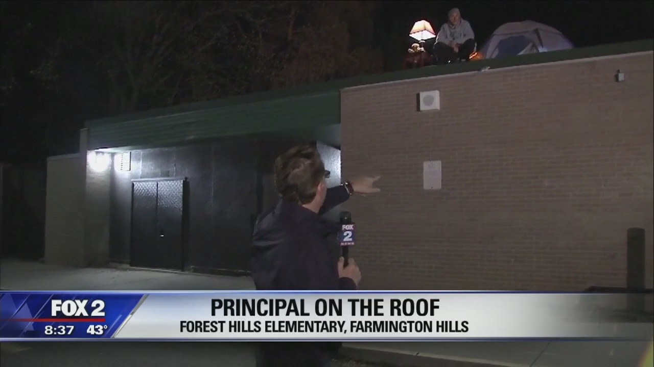 Principal spends night on roof after losing bet to students