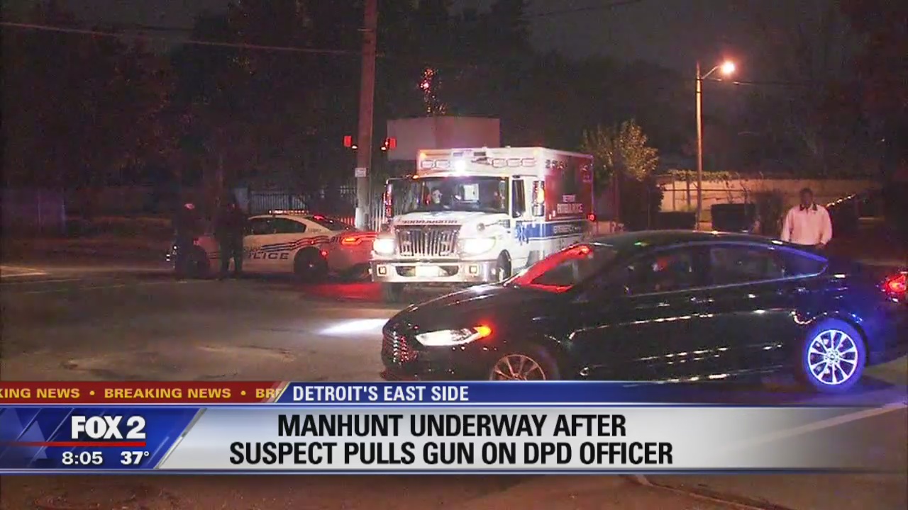 2 arrested after threatening Detroit police with a gun